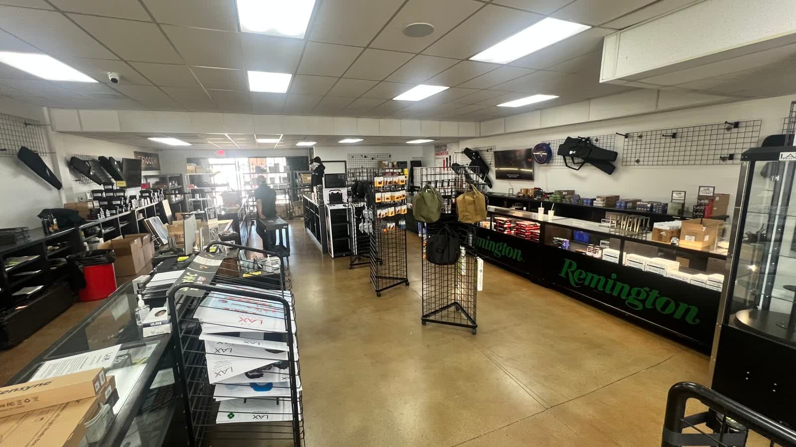 The main floor and display counters inside LAX Ammo San Diego on Mercury St in Kearny Mesa